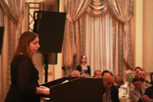 Amy Fagan speaks to attendees of the celebration